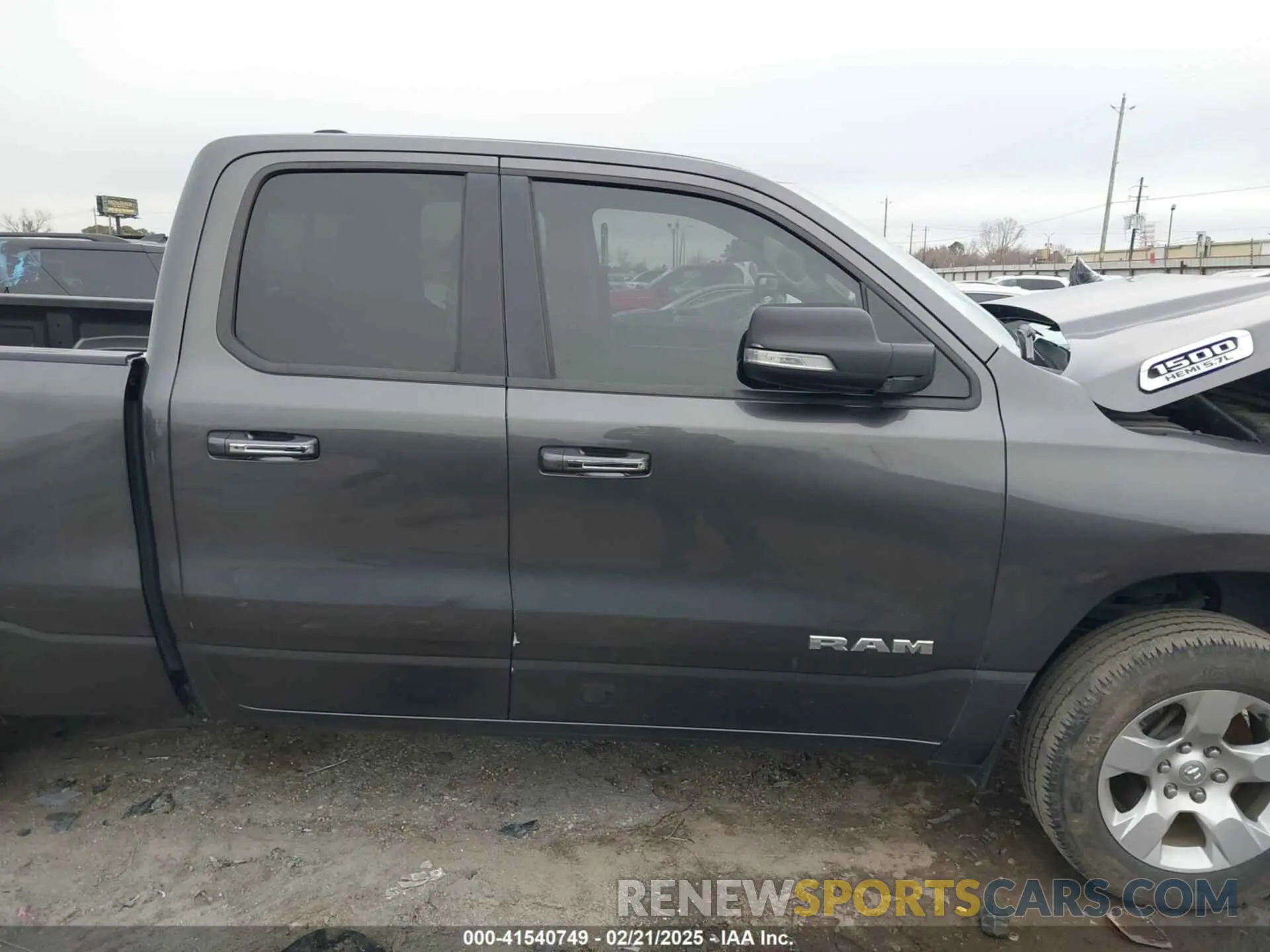 14 Photograph of a damaged car 1C6RREBT0LN210792 RAM 1500 2020