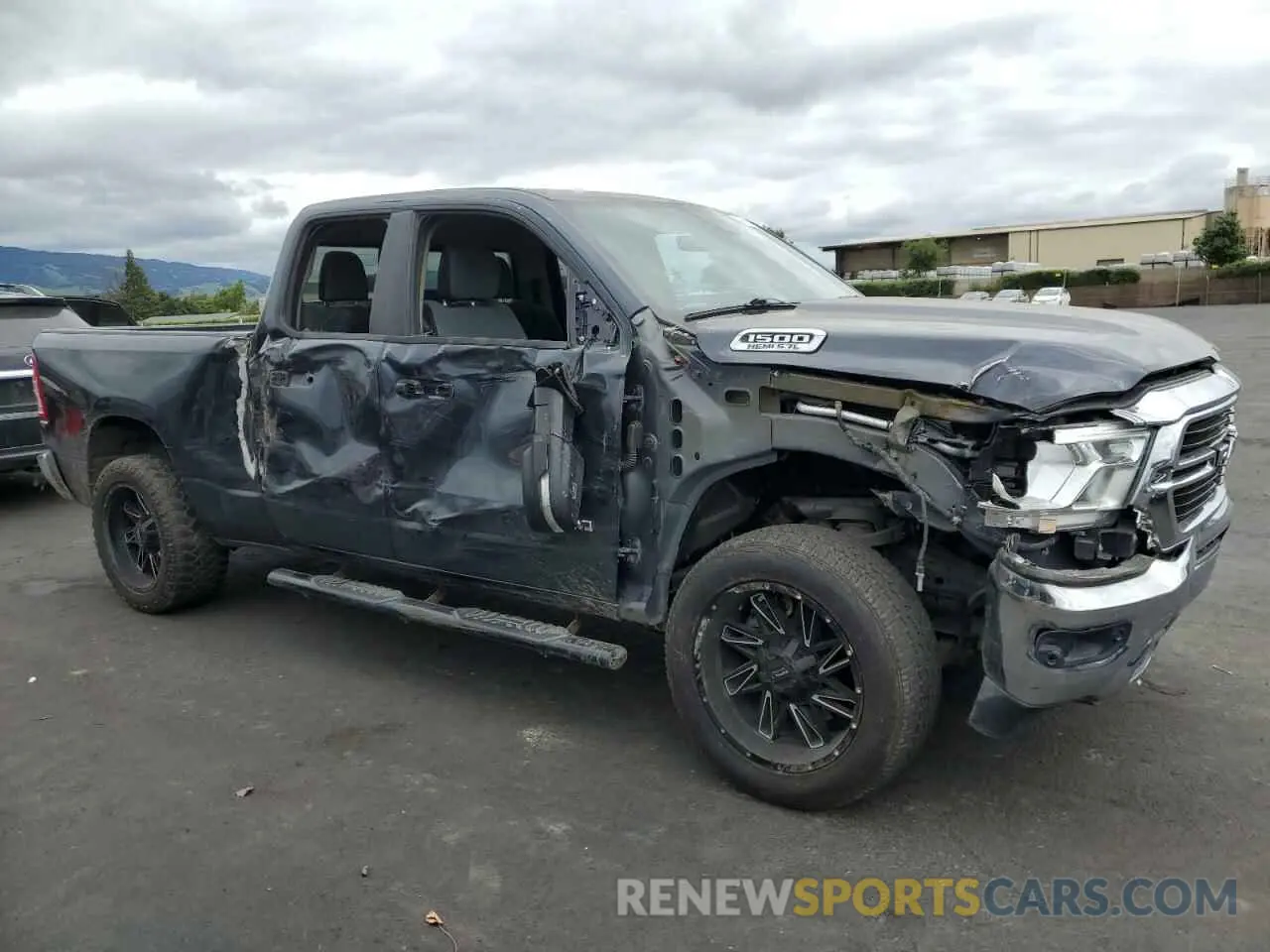 4 Photograph of a damaged car 1C6RREBT1LN278020 RAM 1500 2020