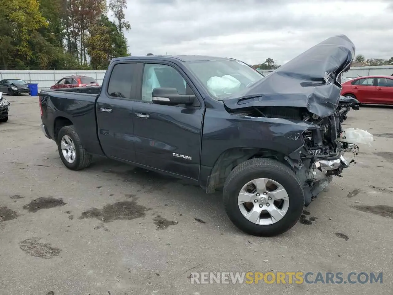 4 Photograph of a damaged car 1C6RREBT7LN300408 RAM 1500 2020