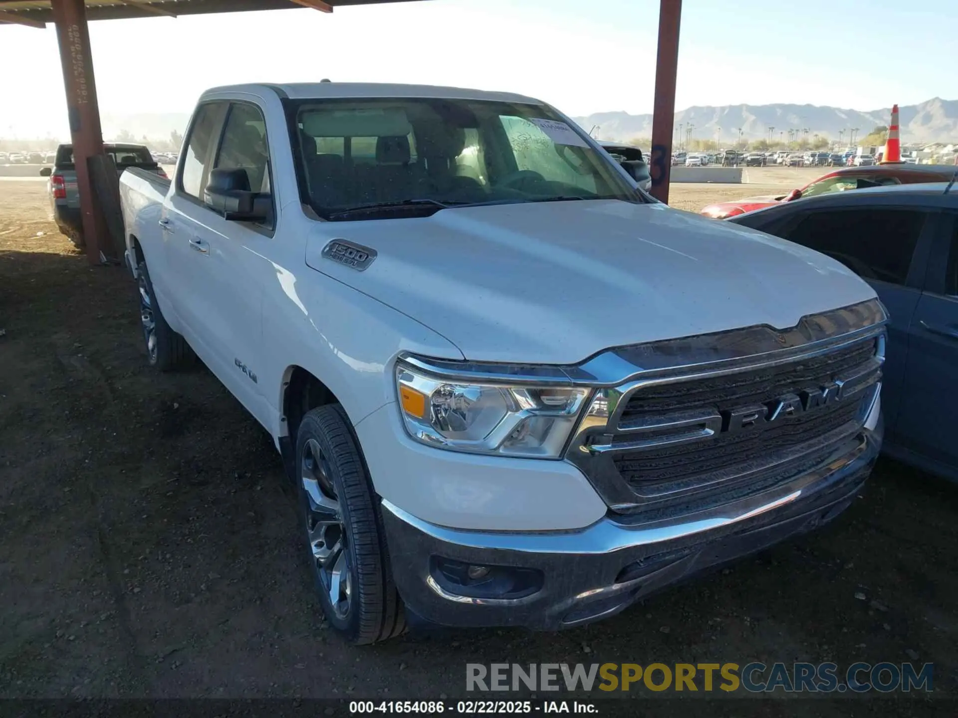 1 Photograph of a damaged car 1C6RREBT9LN210581 RAM 1500 2020