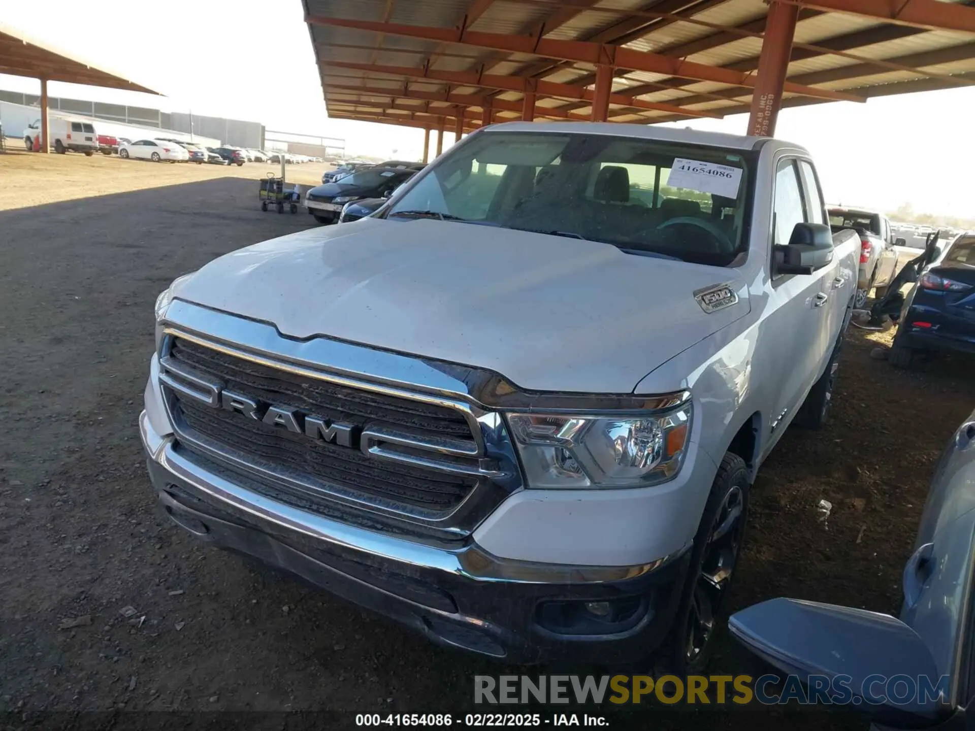 2 Photograph of a damaged car 1C6RREBT9LN210581 RAM 1500 2020