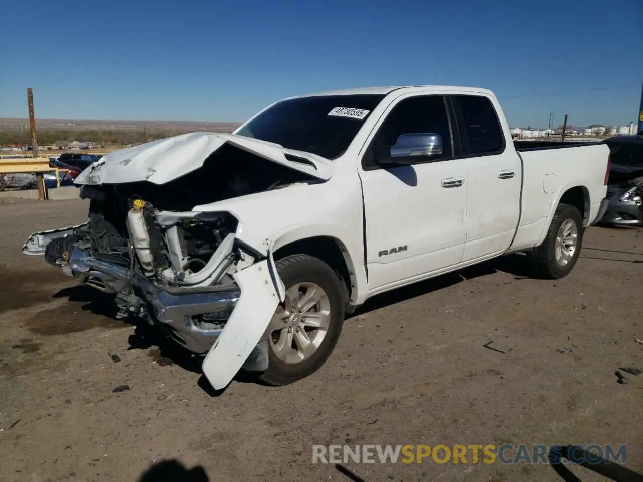 1 Photograph of a damaged car 1C6RREDT0LN294884 RAM 1500 2020