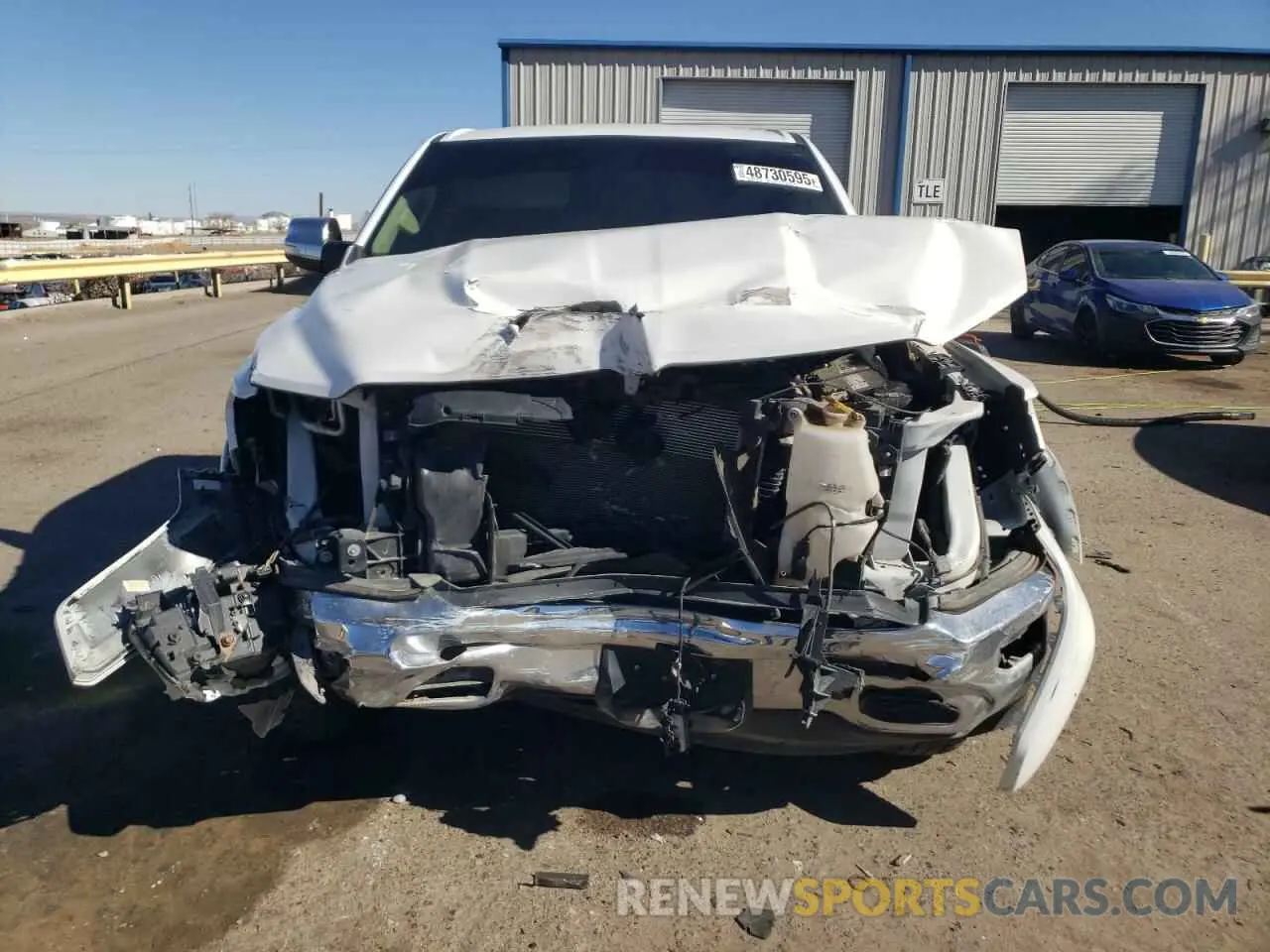 5 Photograph of a damaged car 1C6RREDT0LN294884 RAM 1500 2020