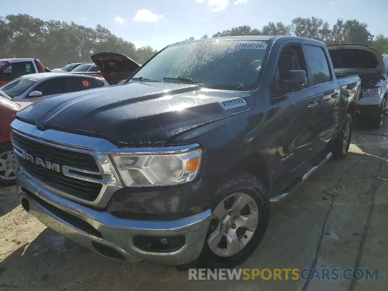 1 Photograph of a damaged car 1C6RREFG0LN229680 RAM 1500 2020