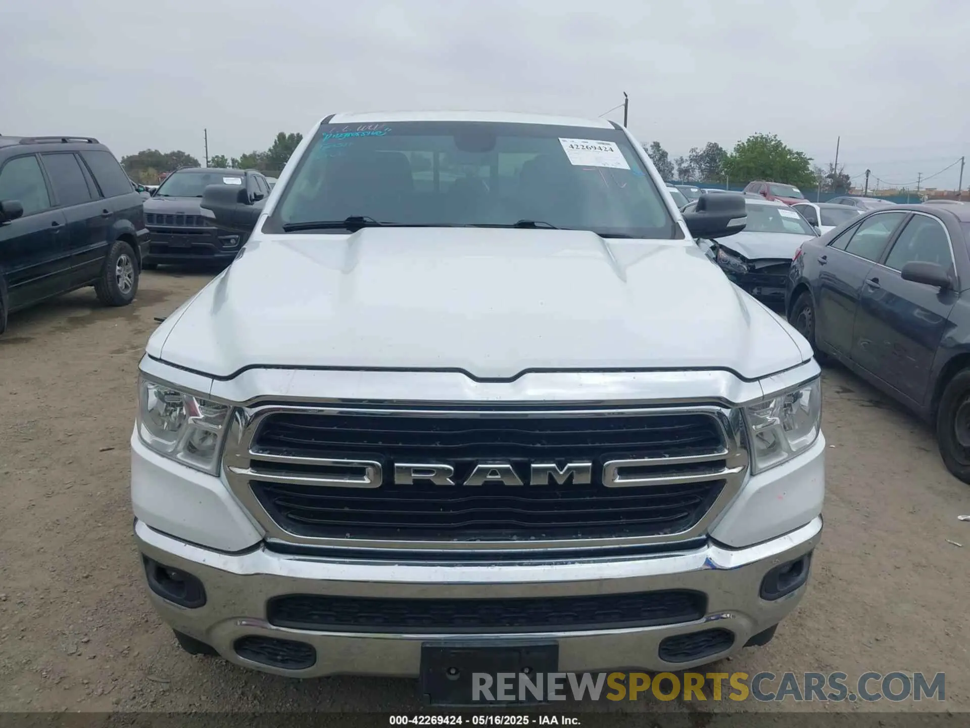 13 Photograph of a damaged car 1C6RREFG3LN129718 RAM 1500 2020