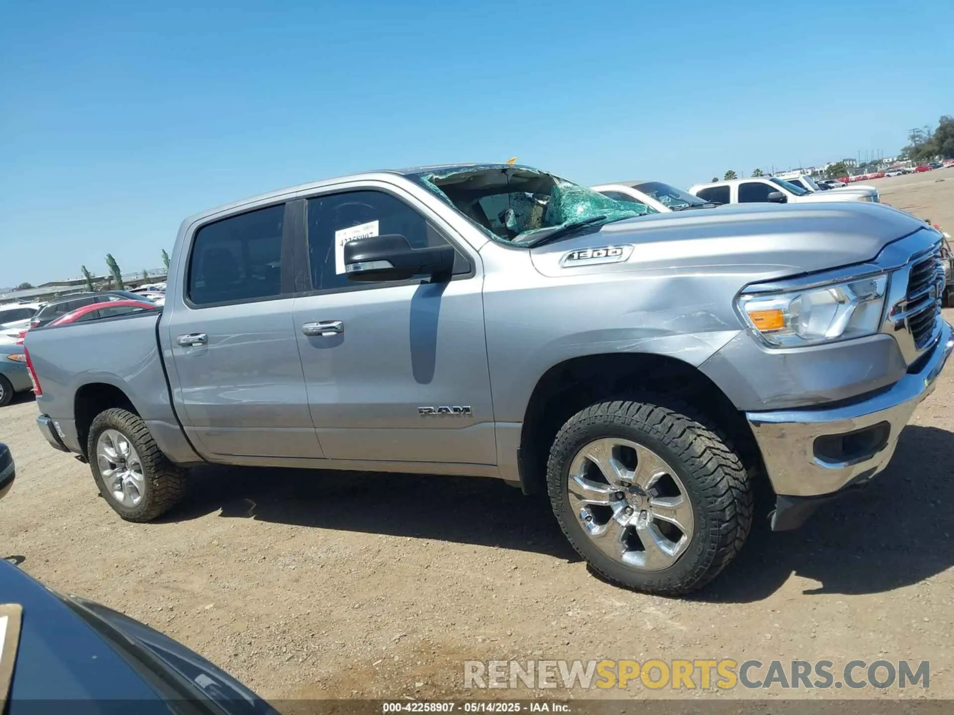 13 Photograph of a damaged car 1C6RREFG7LN333762 RAM 1500 2020