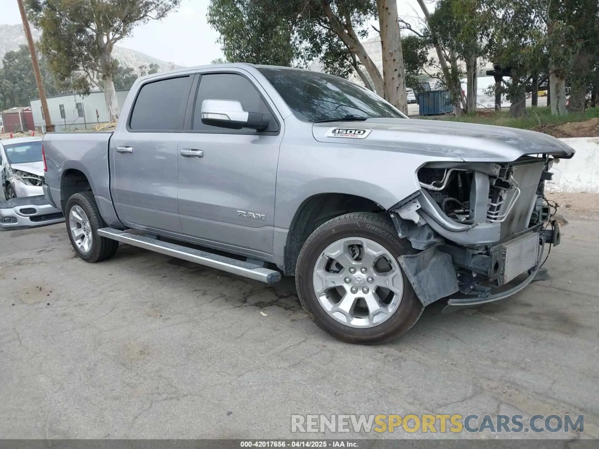 1 Photograph of a damaged car 1C6RREFM6LN398253 RAM 1500 2020