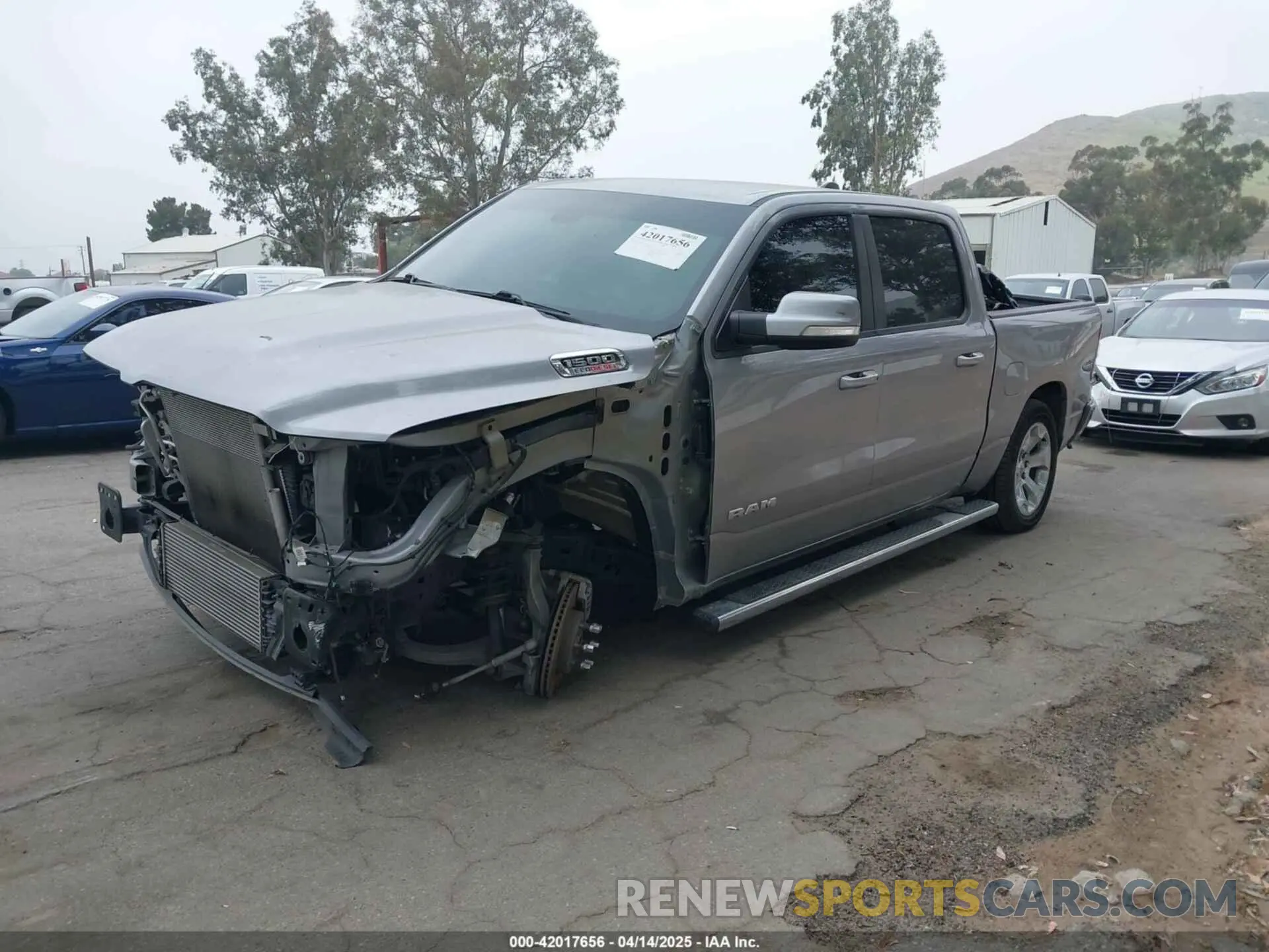 2 Photograph of a damaged car 1C6RREFM6LN398253 RAM 1500 2020