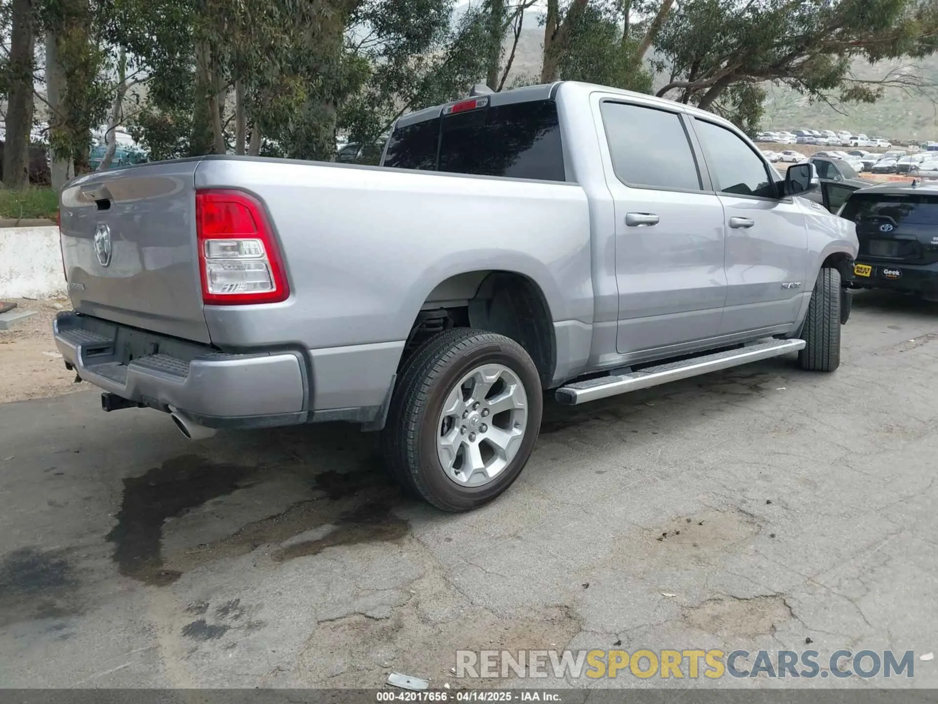 4 Photograph of a damaged car 1C6RREFM6LN398253 RAM 1500 2020
