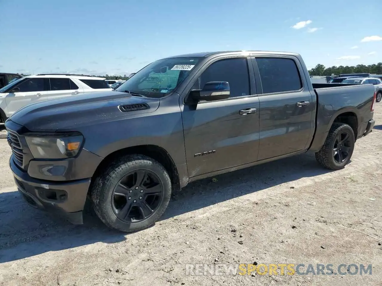 1 Photograph of a damaged car 1C6RREFT0LN406189 RAM 1500 2020