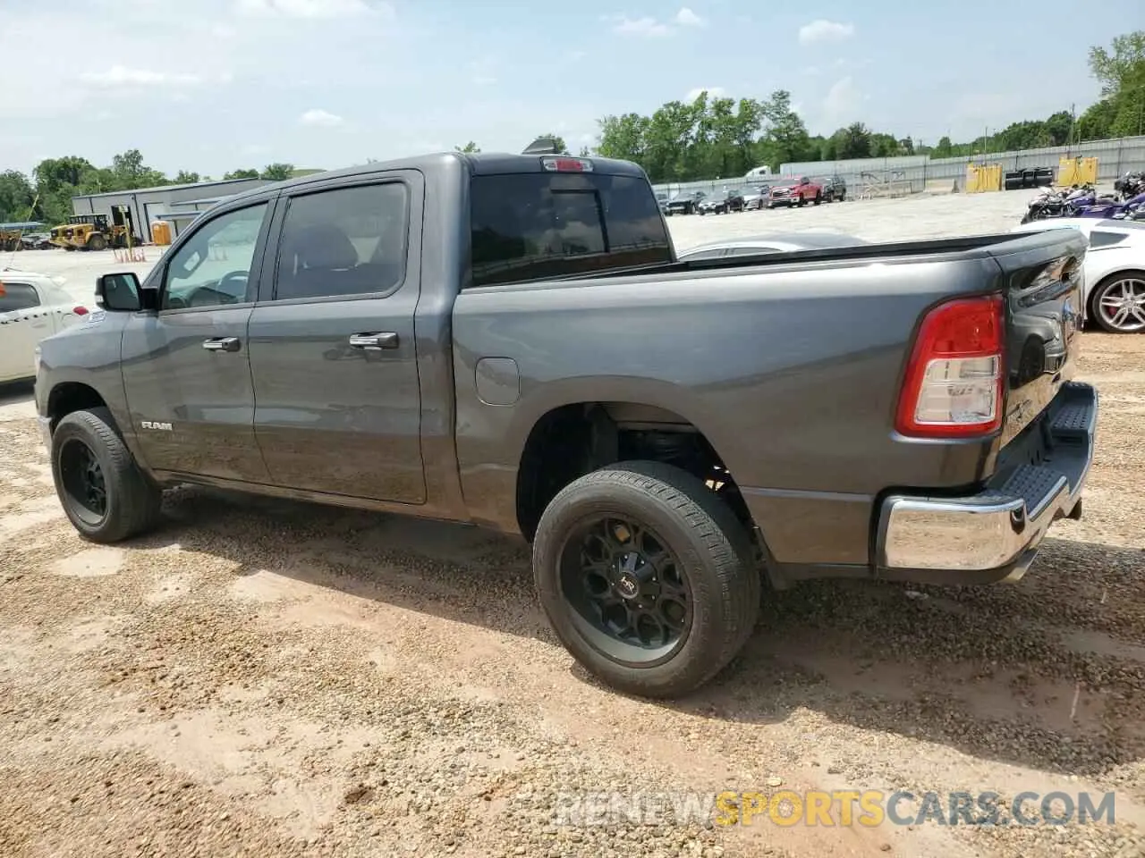 2 Photograph of a damaged car 1C6RREFT0LN406628 RAM 1500 2020