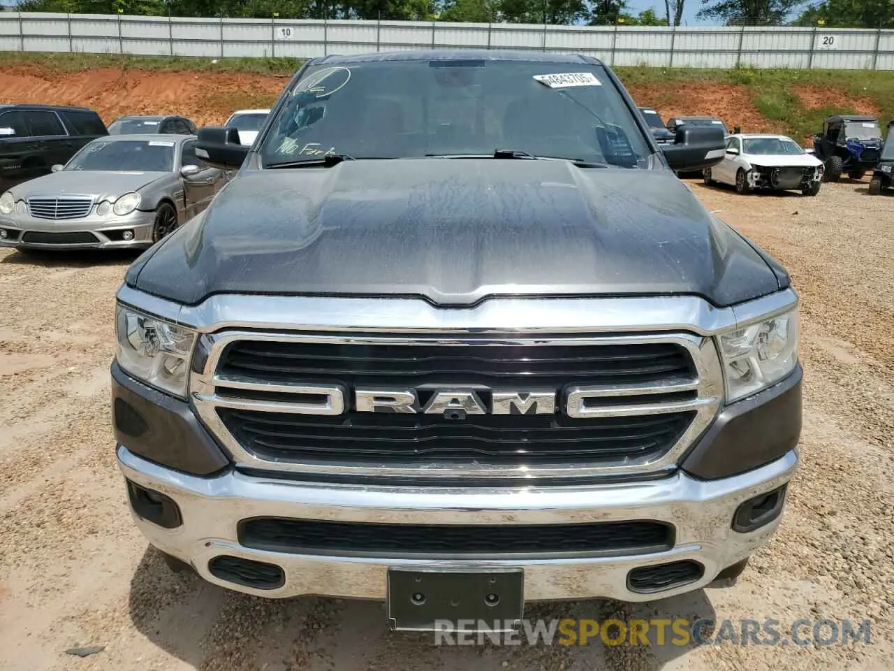 5 Photograph of a damaged car 1C6RREFT0LN406628 RAM 1500 2020