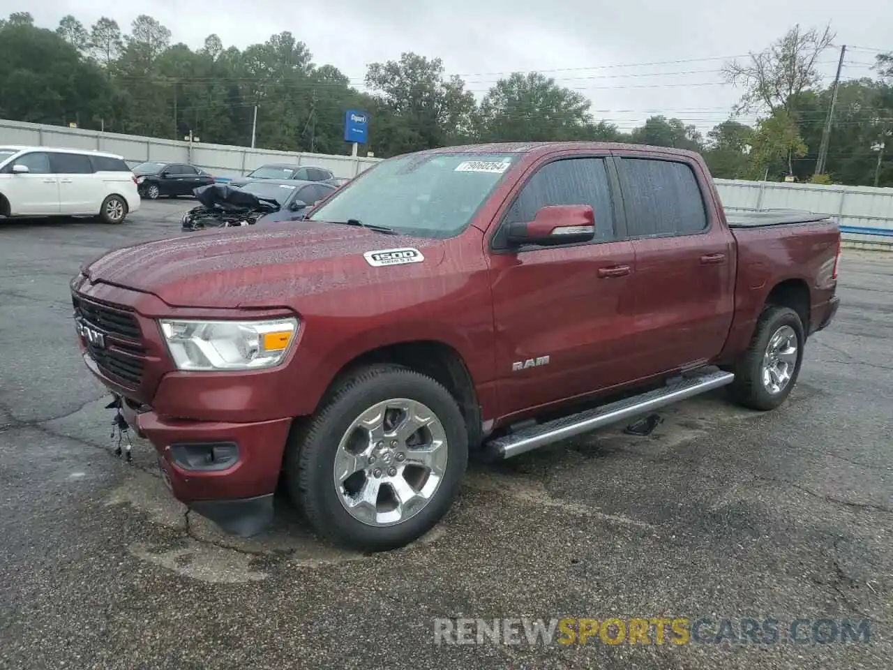 1 Photograph of a damaged car 1C6RREFT1LN112736 RAM 1500 2020