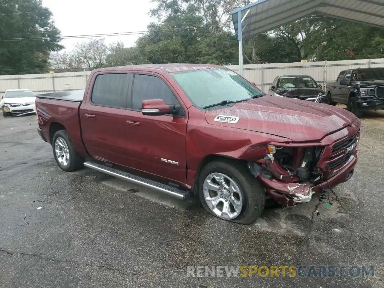 4 Photograph of a damaged car 1C6RREFT1LN112736 RAM 1500 2020