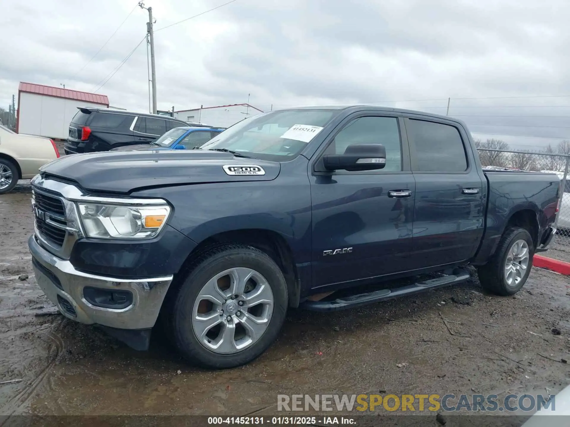 14 Photograph of a damaged car 1C6RREFT1LN344785 RAM 1500 2020