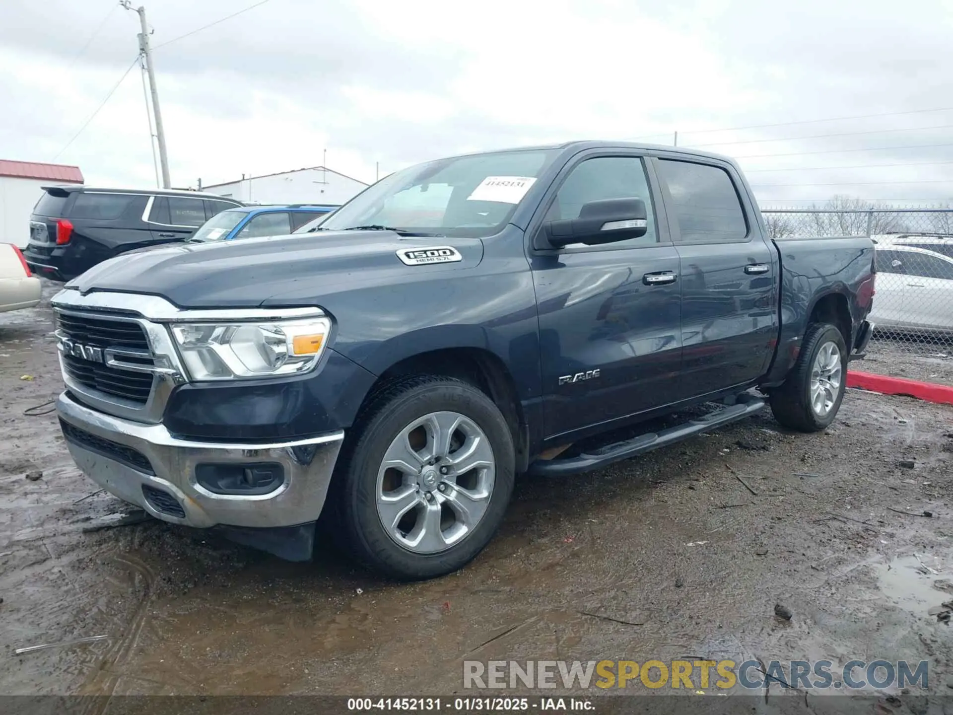 2 Photograph of a damaged car 1C6RREFT1LN344785 RAM 1500 2020