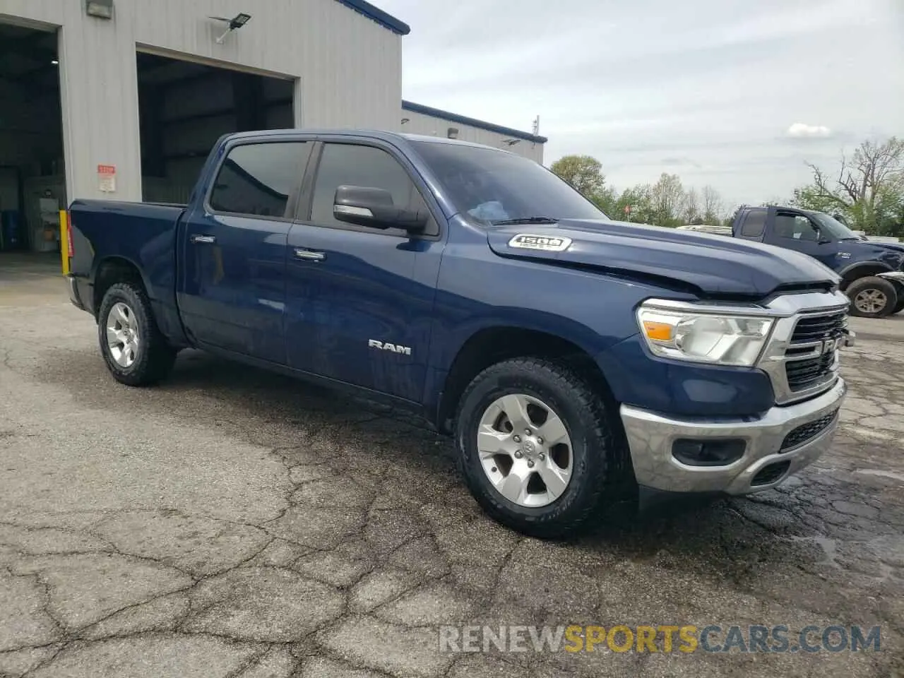 4 Photograph of a damaged car 1C6RREFT1LN344933 RAM 1500 2020
