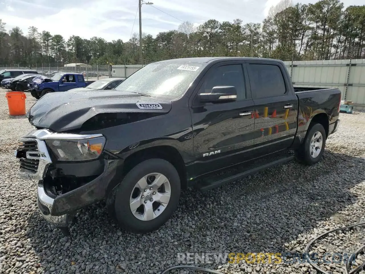 1 Photograph of a damaged car 1C6RREFT1LN406203 RAM 1500 2020