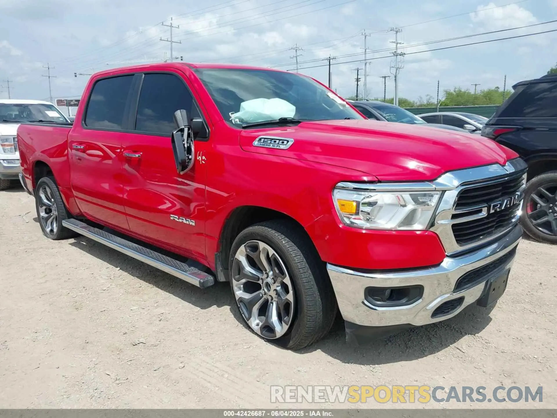 1 Photograph of a damaged car 1C6RREFT1LN406430 RAM 1500 2020
