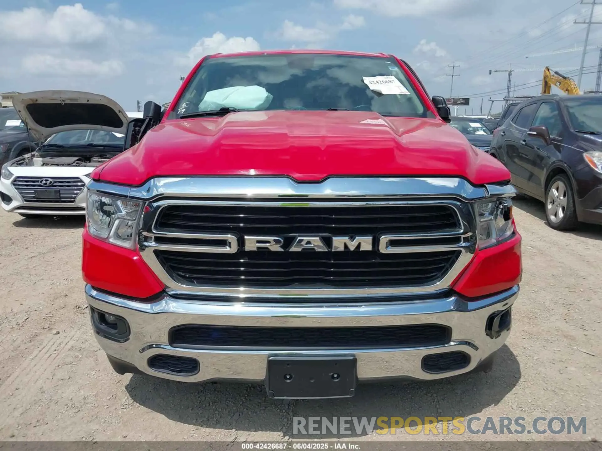 12 Photograph of a damaged car 1C6RREFT1LN406430 RAM 1500 2020