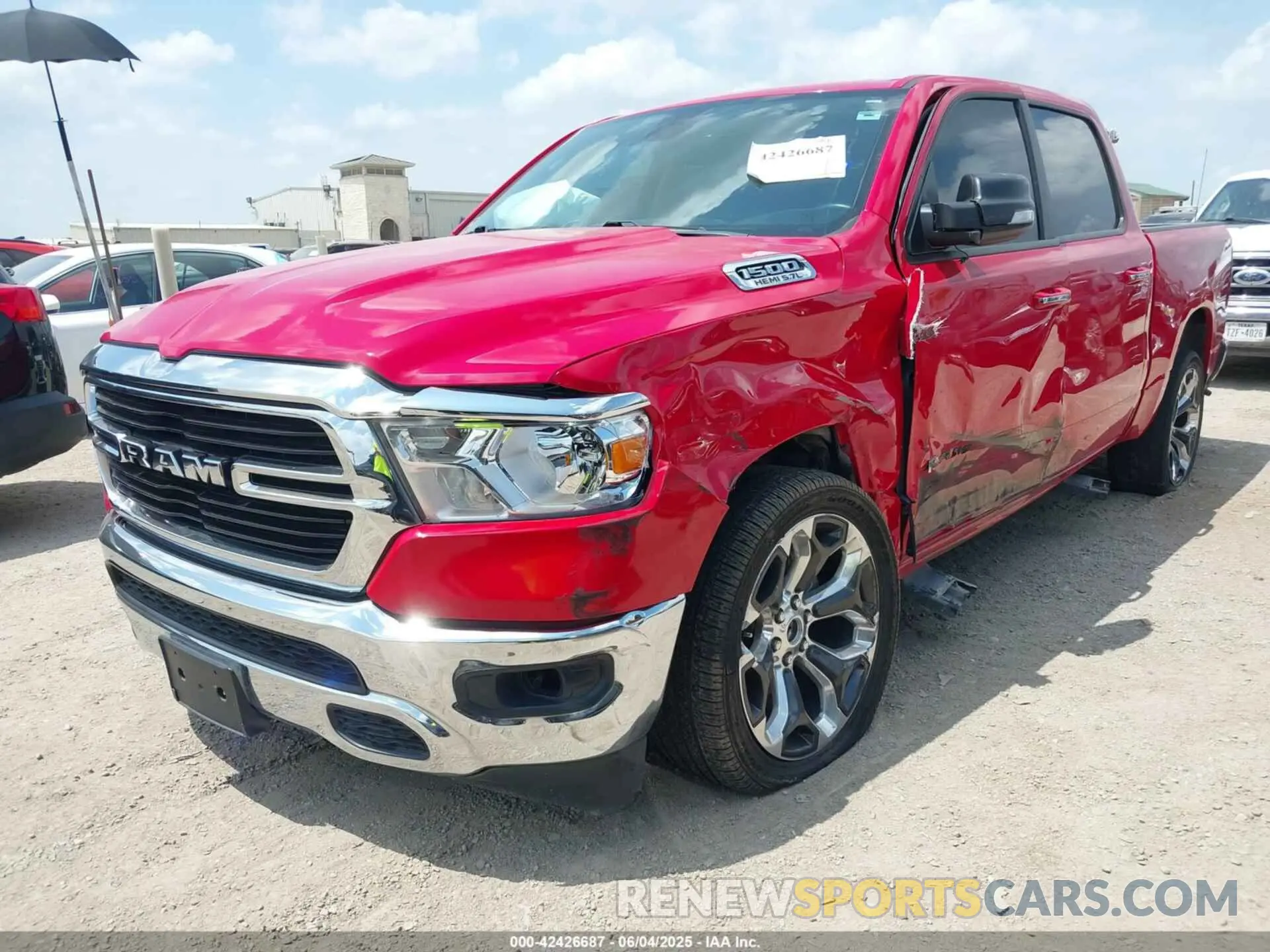 2 Photograph of a damaged car 1C6RREFT1LN406430 RAM 1500 2020