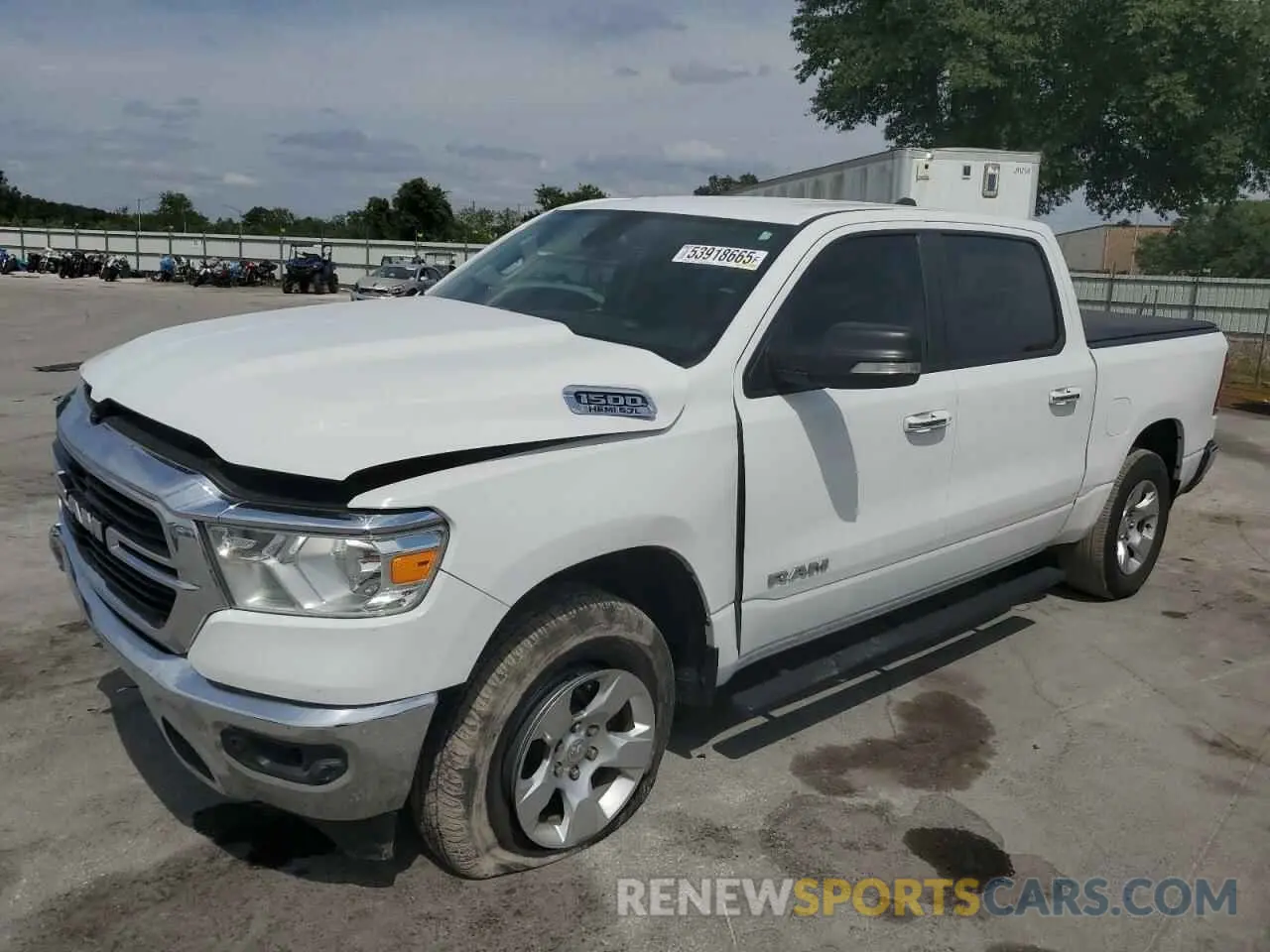 1 Photograph of a damaged car 1C6RREFT2LN406761 RAM 1500 2020