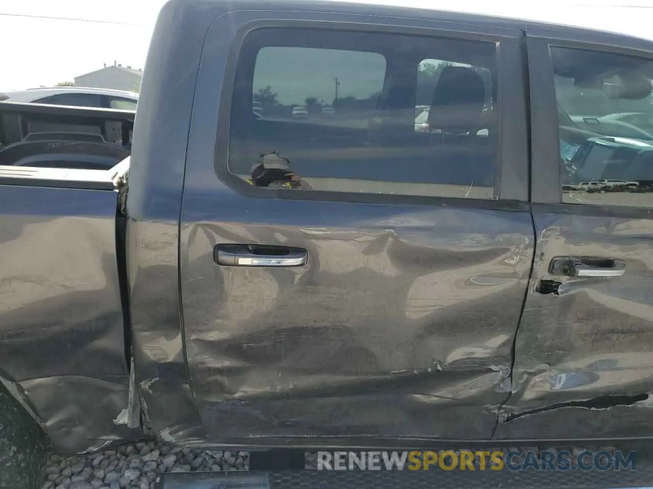 11 Photograph of a damaged car 1C6RREFT3LN117968 RAM 1500 2020