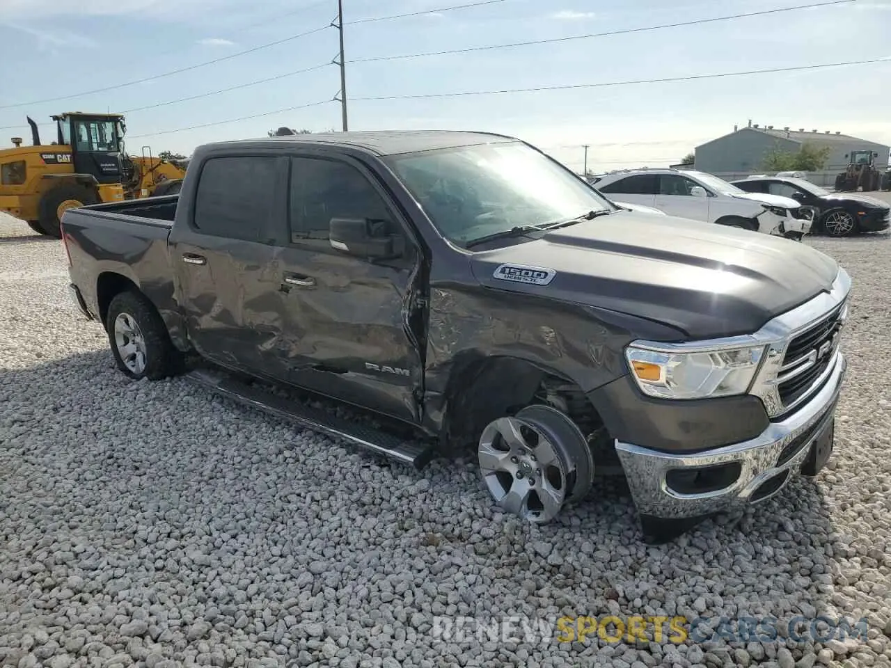 4 Photograph of a damaged car 1C6RREFT3LN117968 RAM 1500 2020