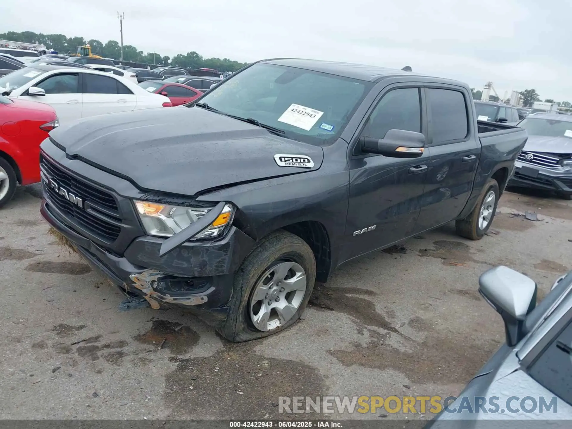 2 Photograph of a damaged car 1C6RREFT3LN320987 RAM 1500 2020