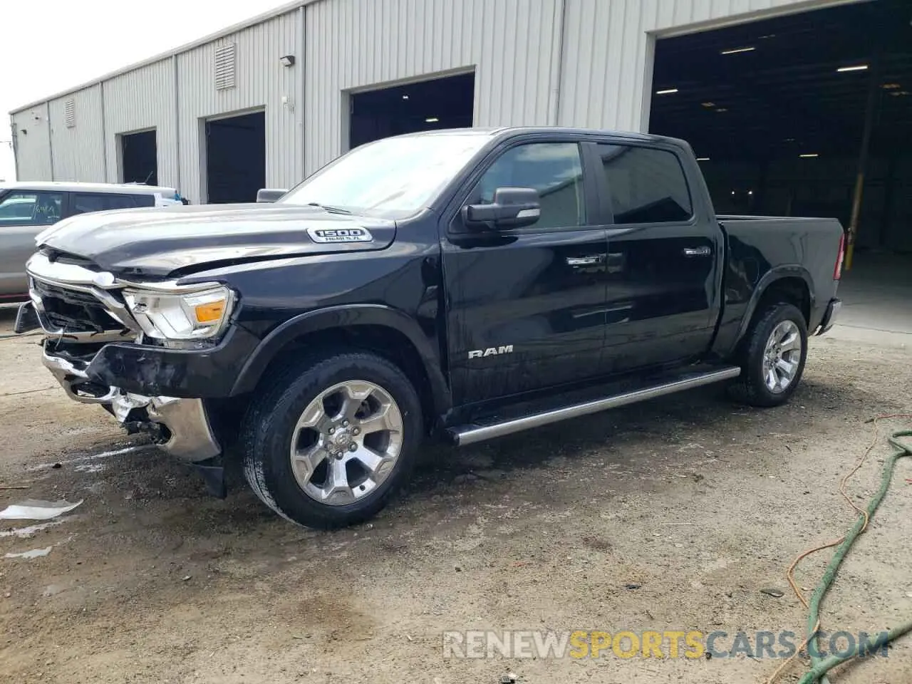 1 Photograph of a damaged car 1C6RREFT3LN353987 RAM 1500 2020