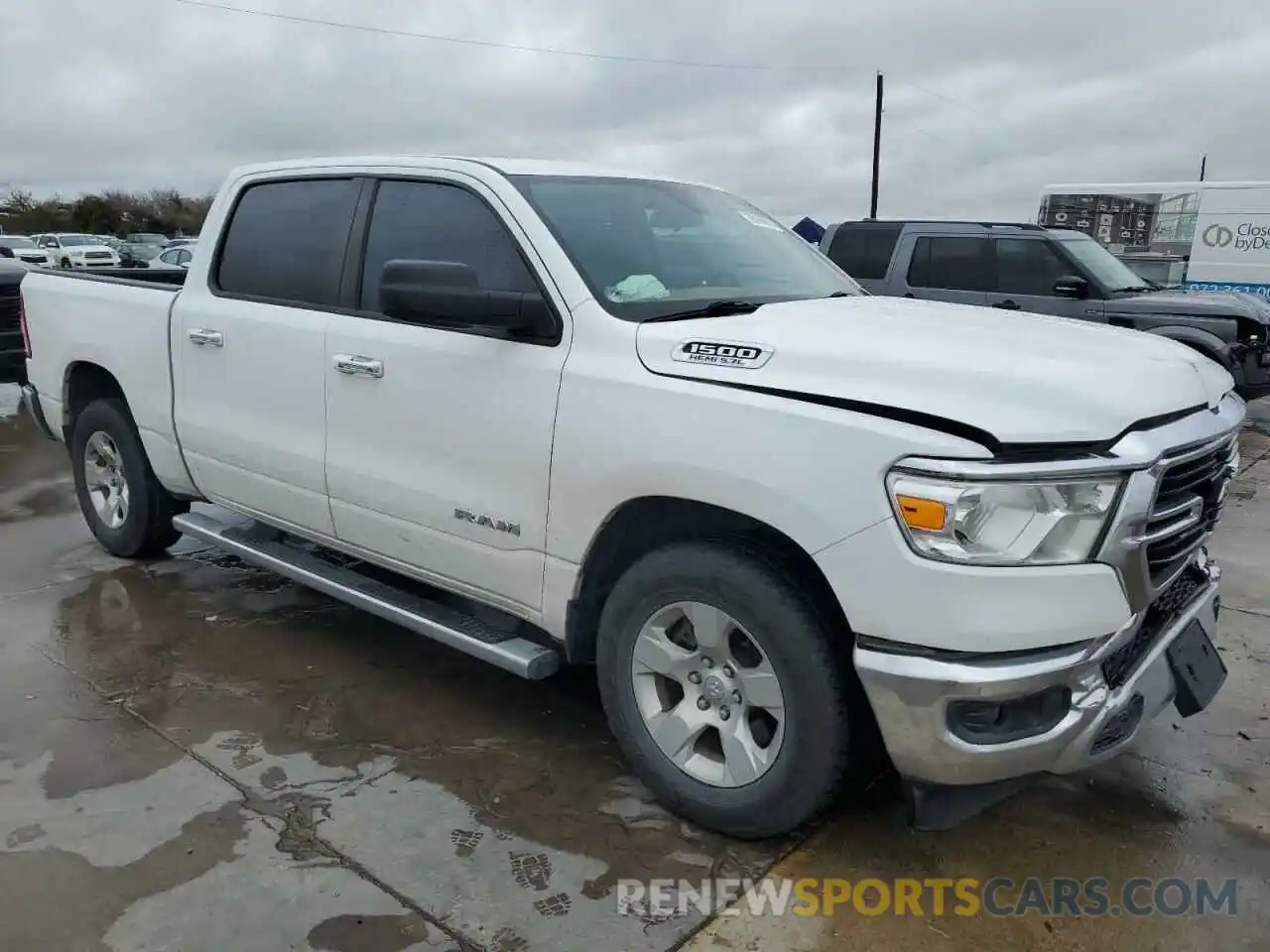 4 Photograph of a damaged car 1C6RREFT3LN390330 RAM 1500 2020