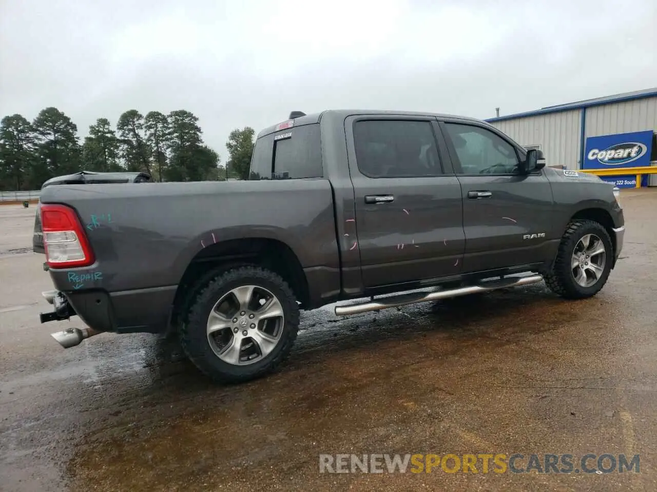 3 Photograph of a damaged car 1C6RREFT3LN401746 RAM 1500 2020