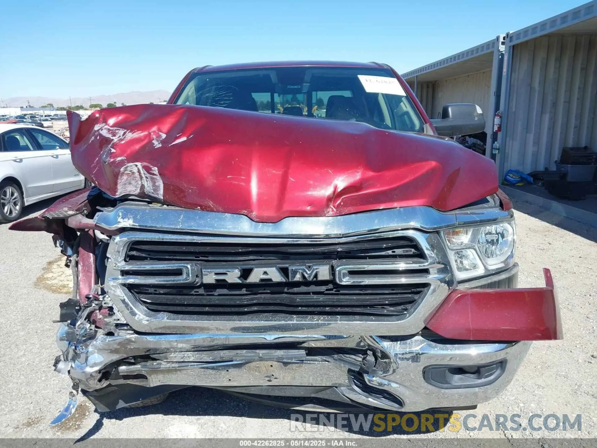 12 Photograph of a damaged car 1C6RREFT4LN105571 RAM 1500 2020