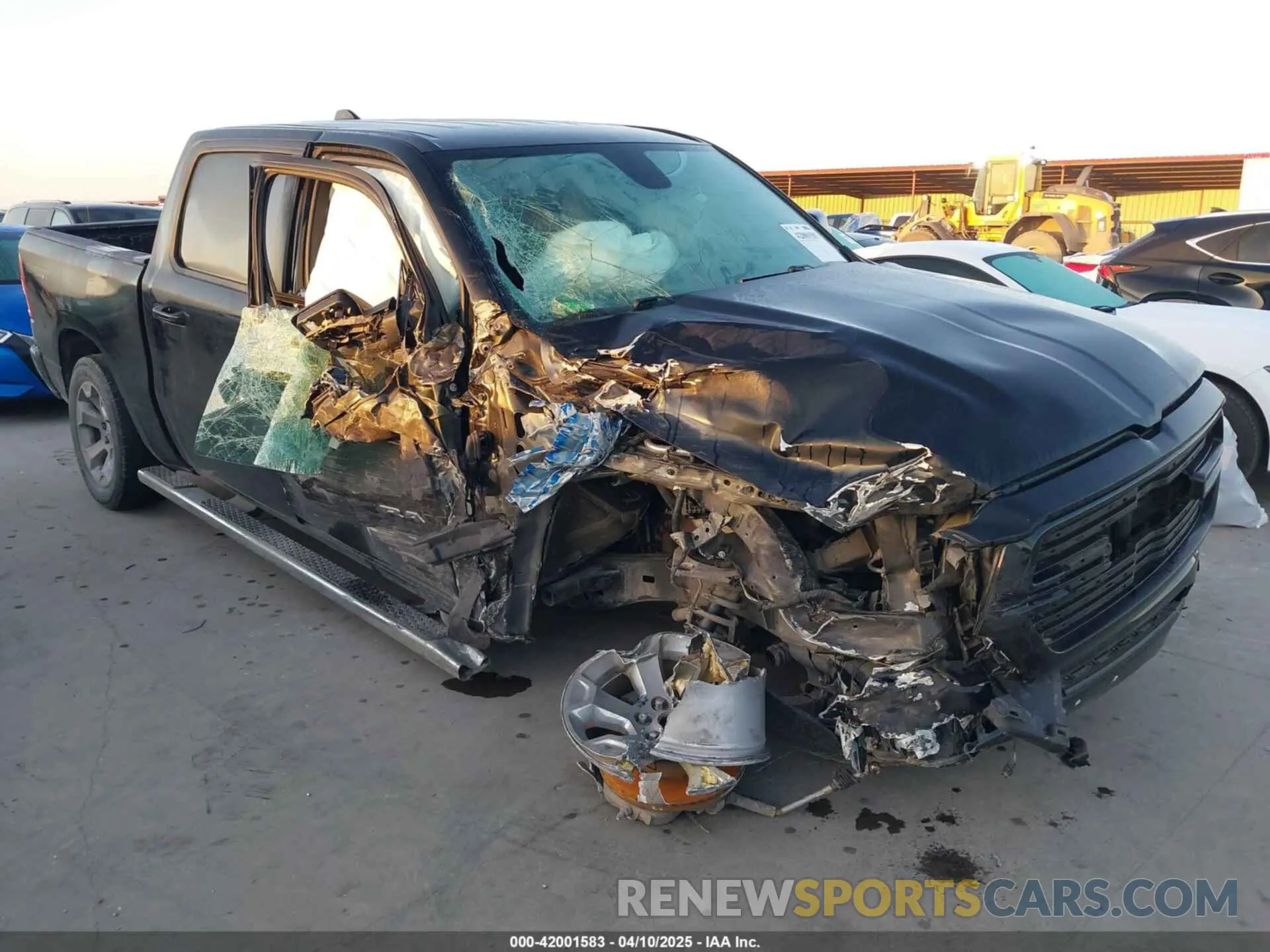 1 Photograph of a damaged car 1C6RREFT4LN295260 RAM 1500 2020