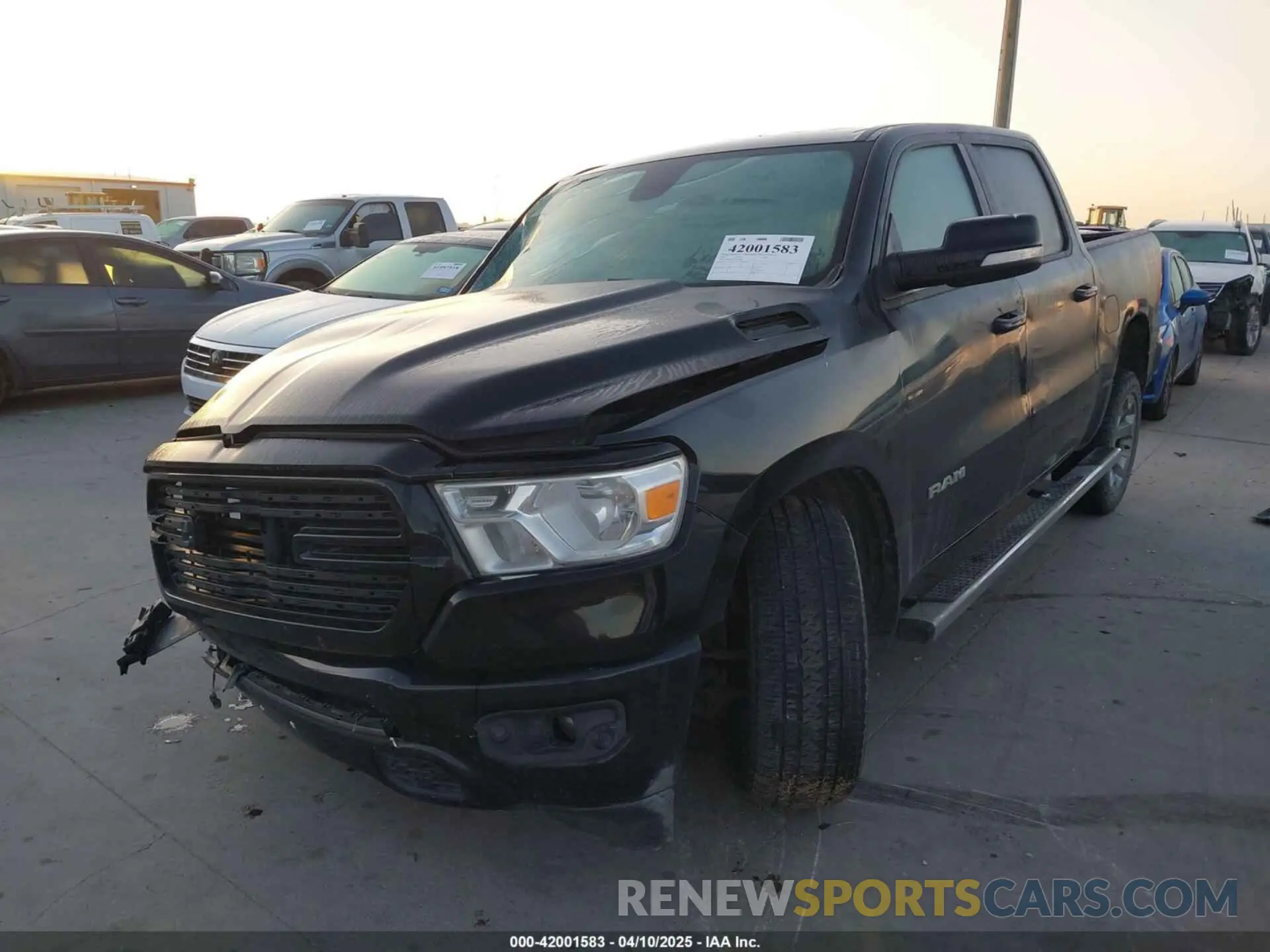 2 Photograph of a damaged car 1C6RREFT4LN295260 RAM 1500 2020