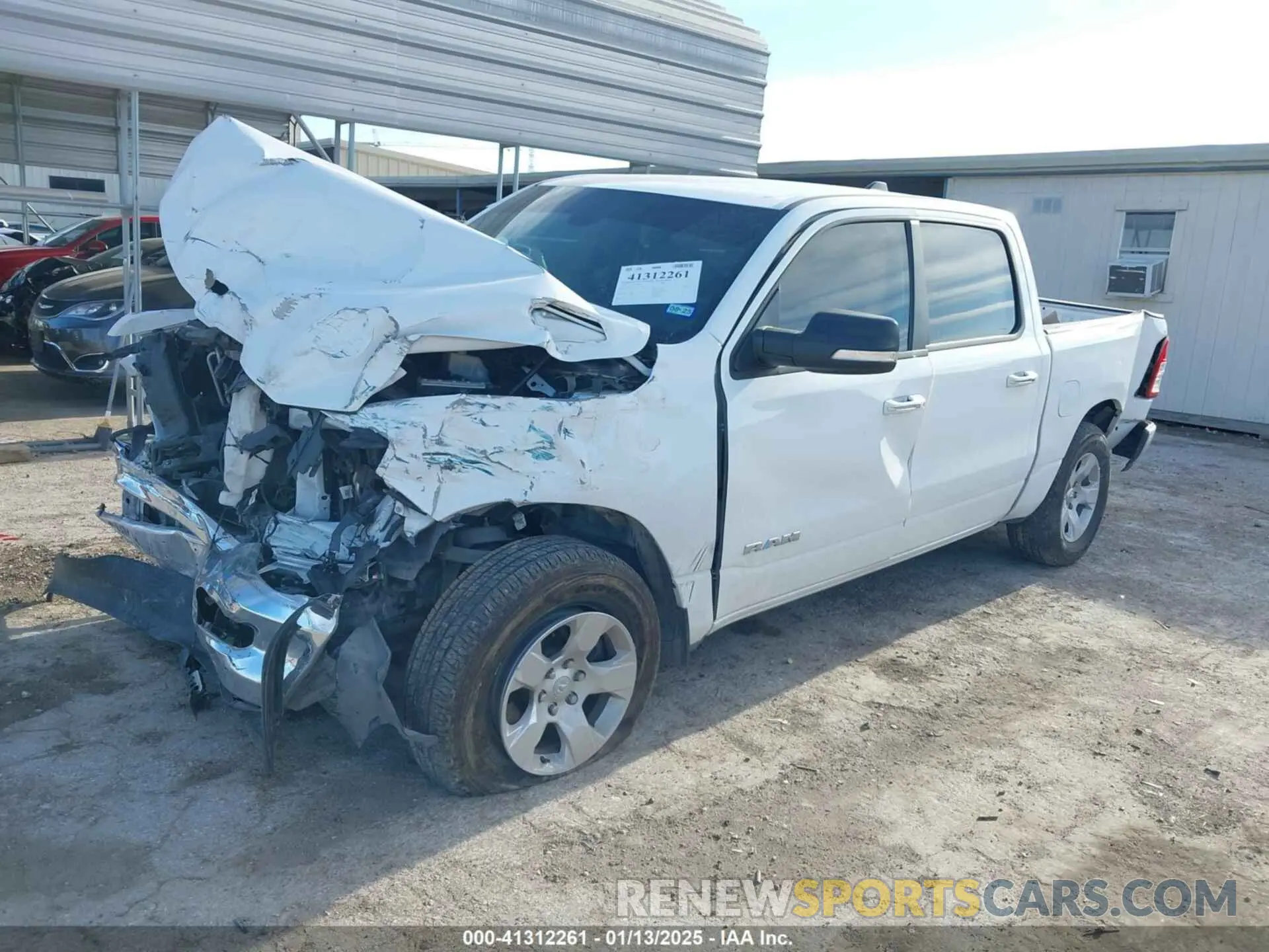 2 Photograph of a damaged car 1C6RREFT4LN333926 RAM 1500 2020