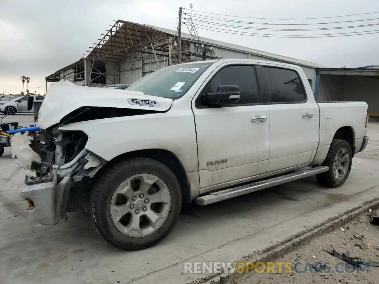1 Photograph of a damaged car 1C6RREFT4LN353982 RAM 1500 2020