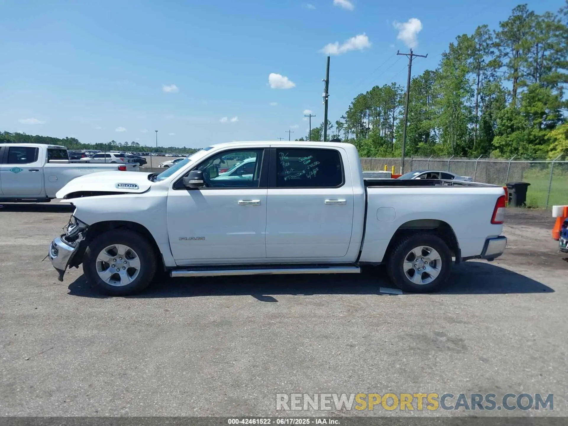 14 Photograph of a damaged car 1C6RREFT5LN337869 RAM 1500 2020