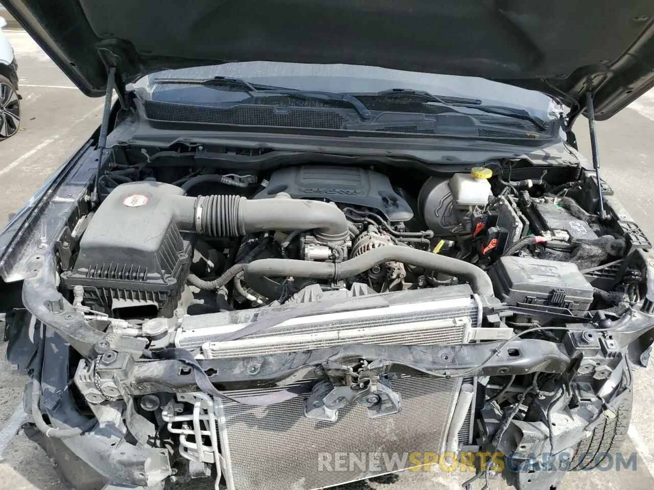 11 Photograph of a damaged car 1C6RREFT6LN152424 RAM 1500 2020