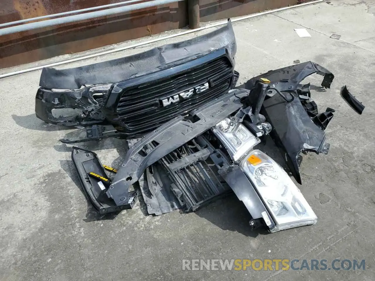 12 Photograph of a damaged car 1C6RREFT6LN152424 RAM 1500 2020