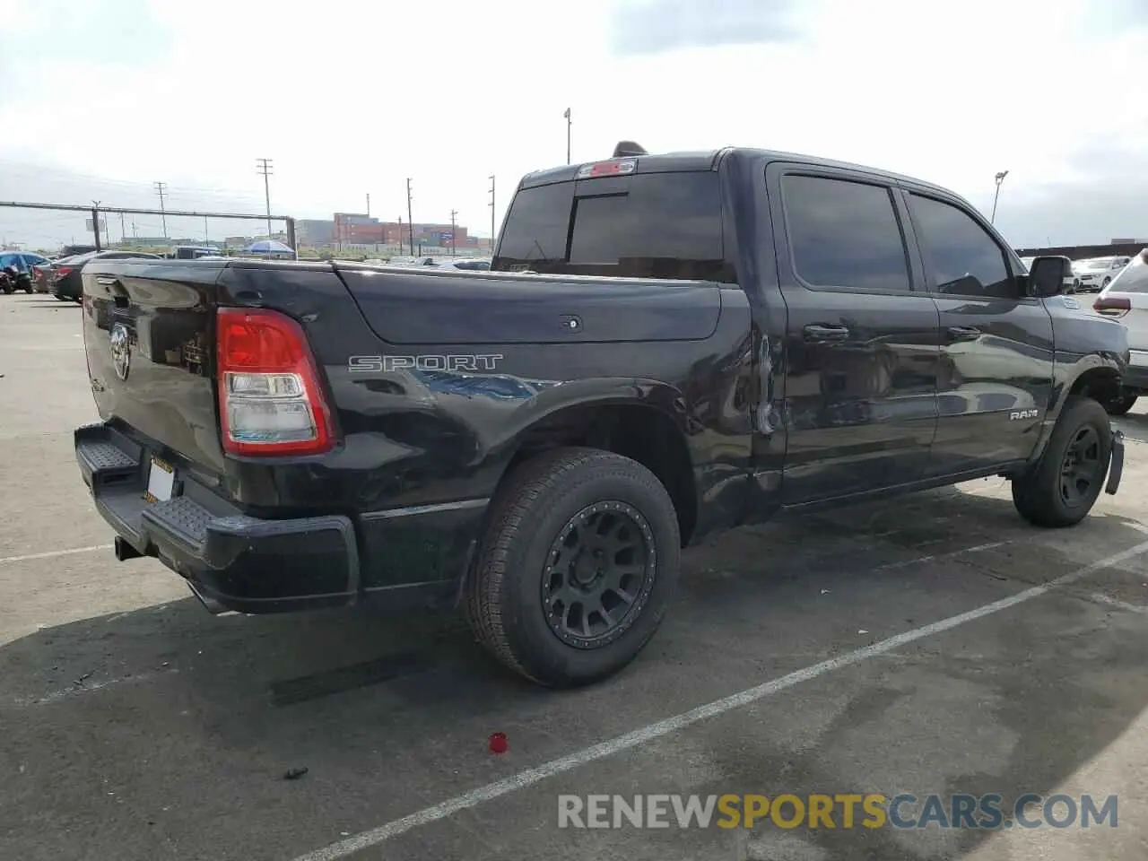 3 Photograph of a damaged car 1C6RREFT6LN152424 RAM 1500 2020