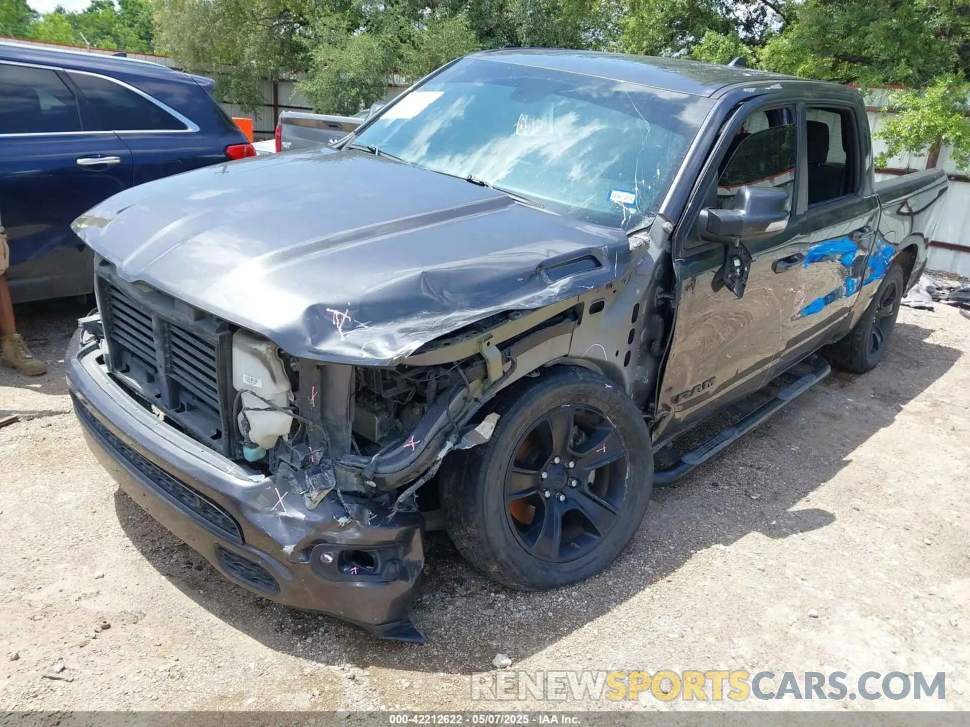 2 Photograph of a damaged car 1C6RREFT7LN121697 RAM 1500 2020