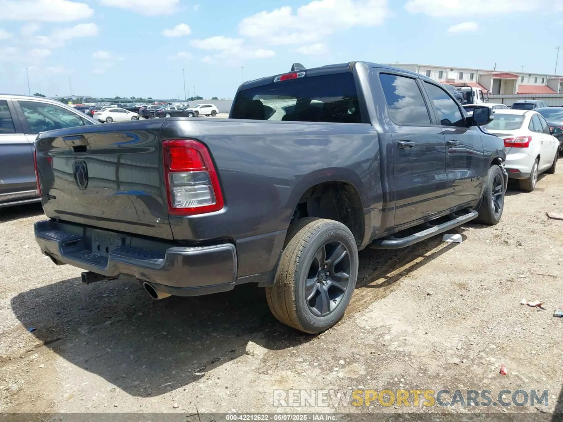 4 Photograph of a damaged car 1C6RREFT7LN121697 RAM 1500 2020