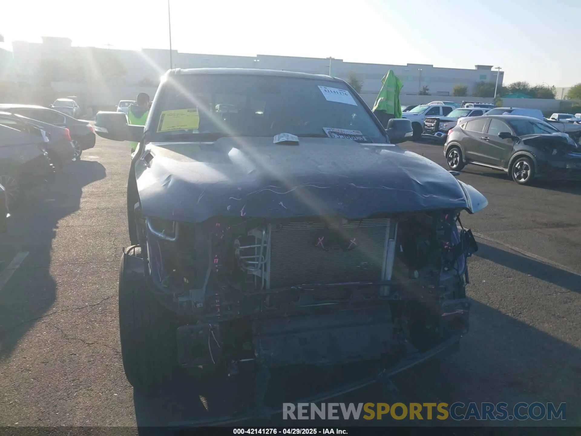 13 Photograph of a damaged car 1C6RREFT7LN401927 RAM 1500 2020