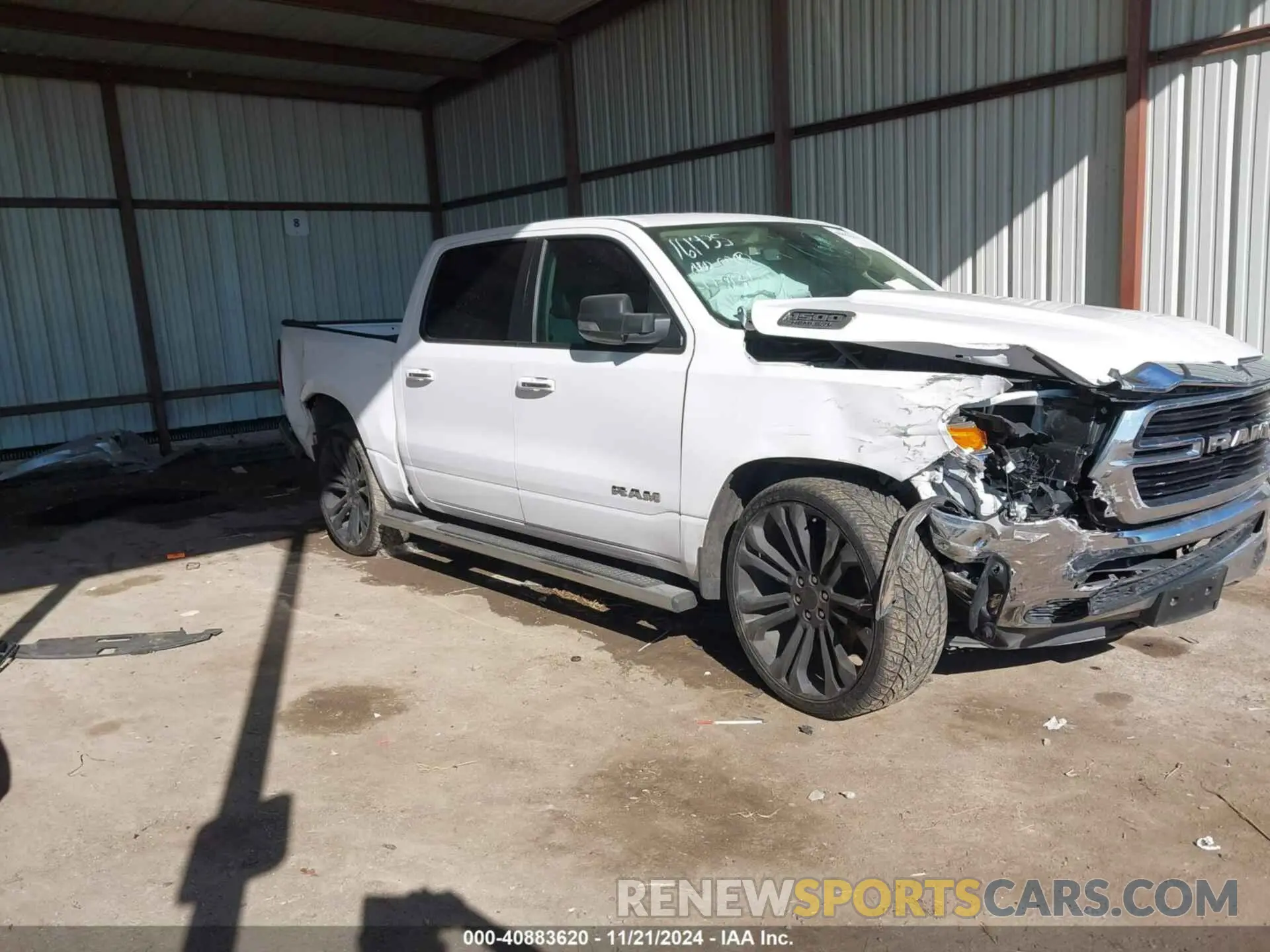 1 Photograph of a damaged car 1C6RREFT8LN232940 RAM 1500 2020