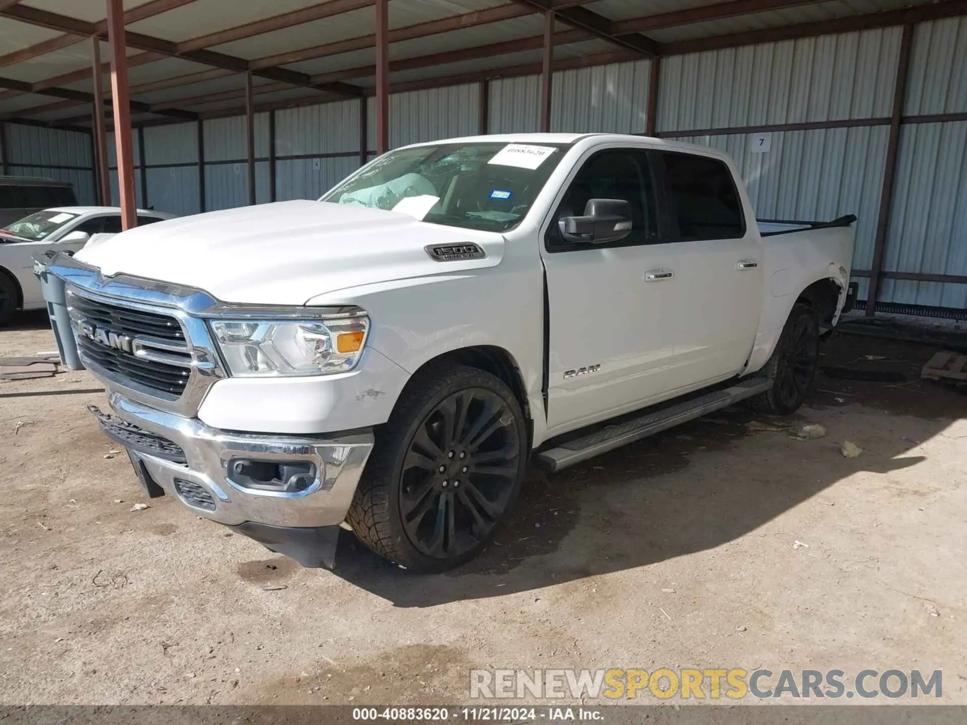2 Photograph of a damaged car 1C6RREFT8LN232940 RAM 1500 2020
