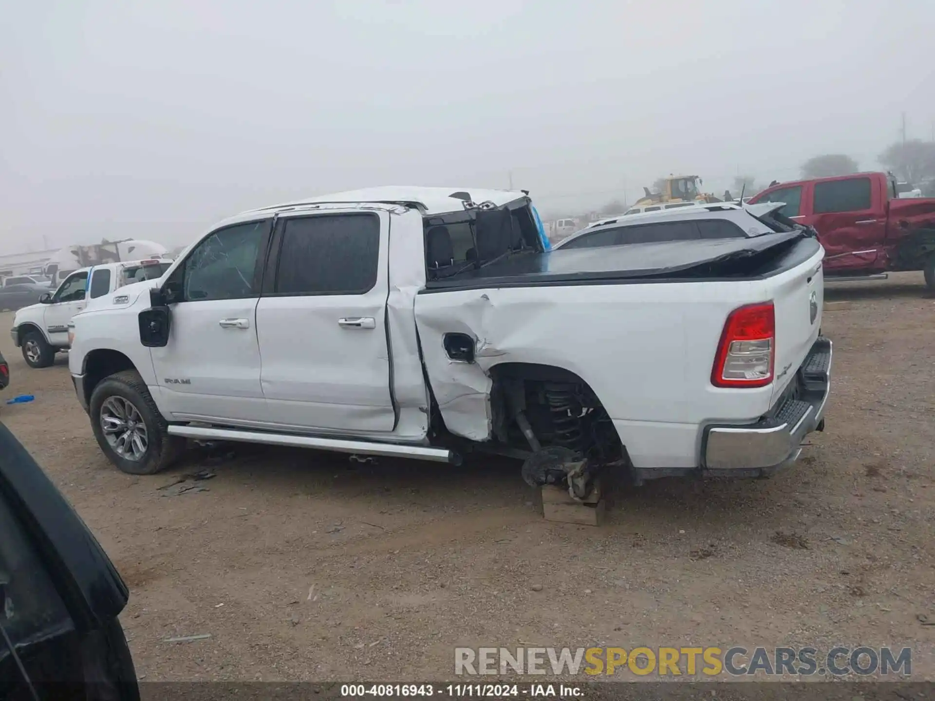 14 Photograph of a damaged car 1C6RREFT9LN401699 RAM 1500 2020