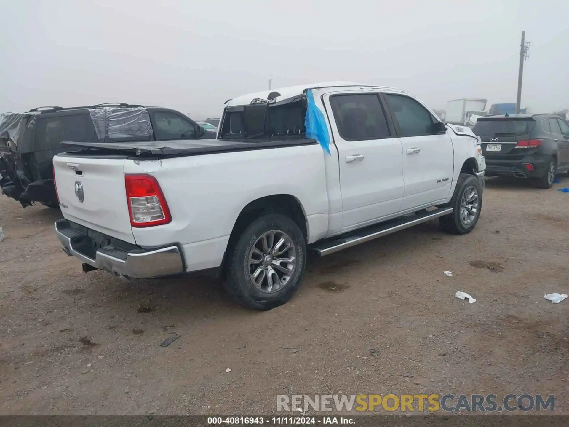 4 Photograph of a damaged car 1C6RREFT9LN401699 RAM 1500 2020