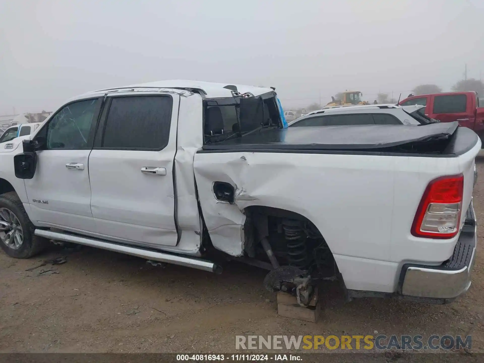 6 Photograph of a damaged car 1C6RREFT9LN401699 RAM 1500 2020