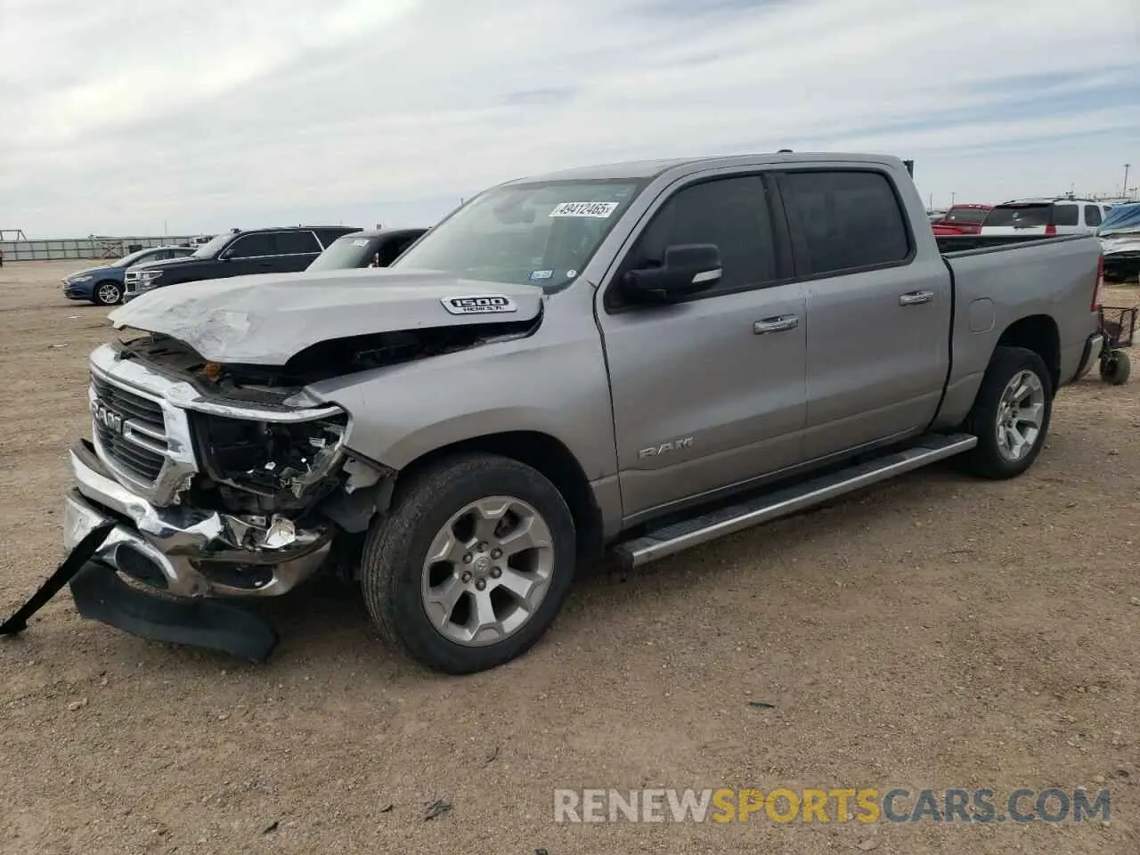 1 Photograph of a damaged car 1C6RREFTXLN180226 RAM 1500 2020